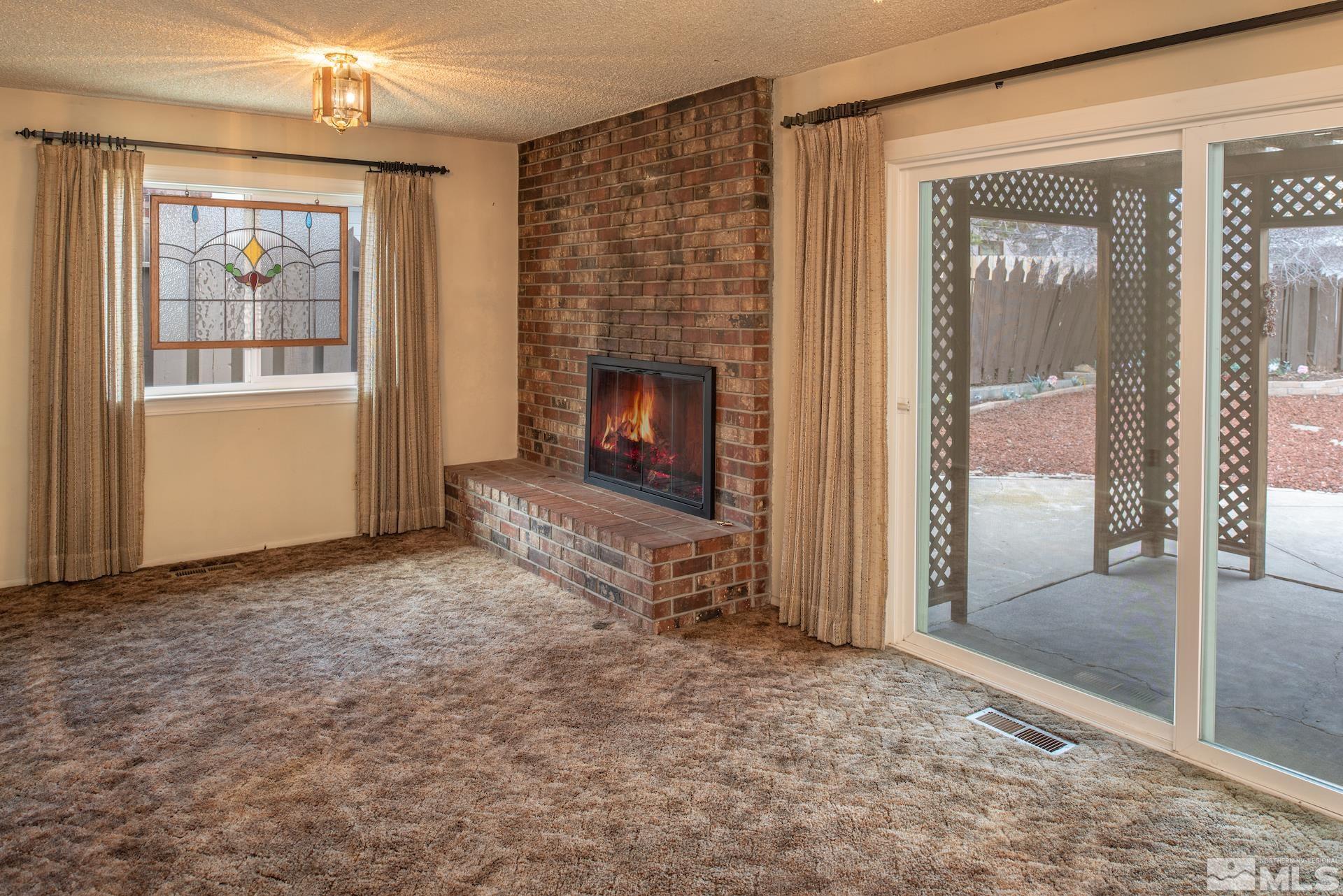 2055 Prince Way Reno, NV 89503 - Photo 10 of 35 a view of a livingroom with a fireplace