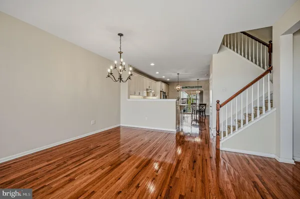 a view of entryway with wooden floor