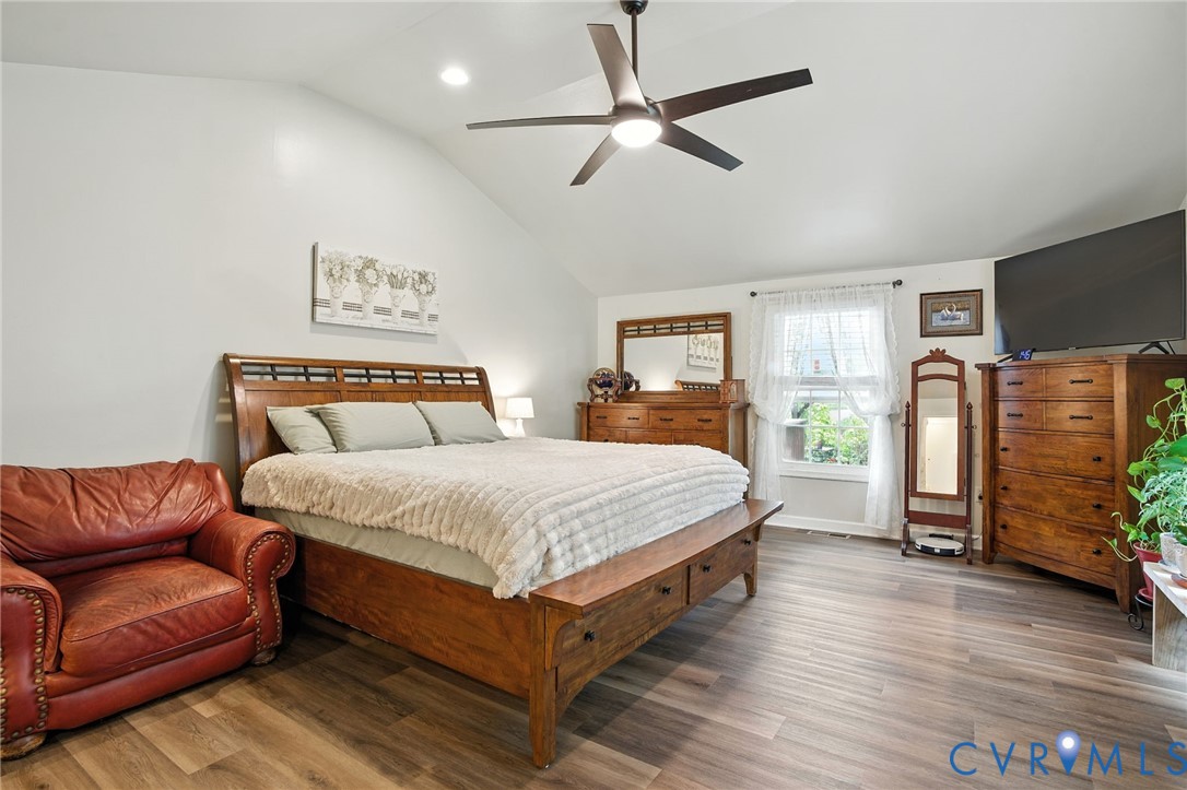 1946 Walmsley Road Callao, VA 22435 - Photo 21 of 49 a bedroom with a bed couch and window