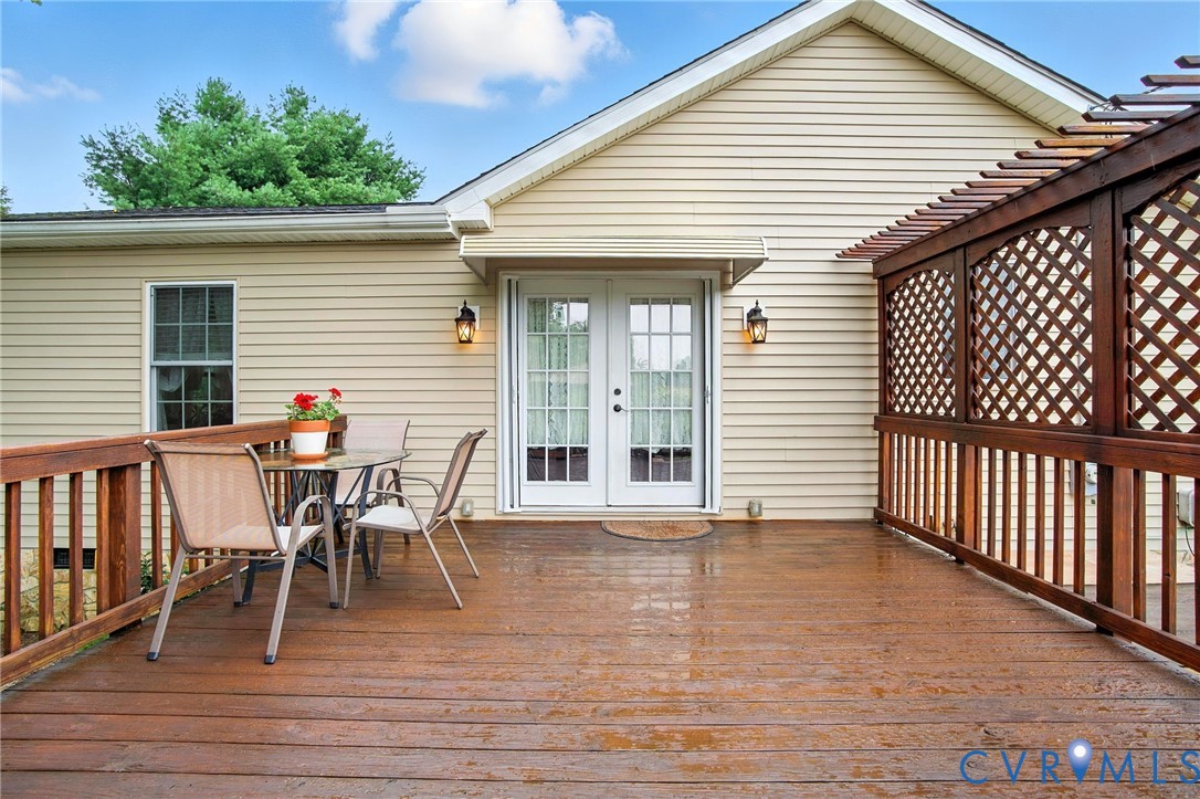 1946 Walmsley Road Callao, VA 22435 - Photo 36 of 49 a view of a house with wooden deck and furniture