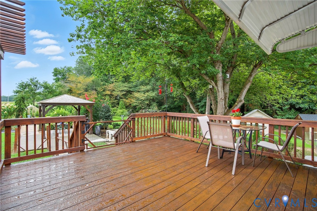 1946 Walmsley Road Callao, VA 22435 - Photo 37 of 49 a view of balcony with deck and outdoor seating