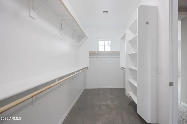 a view of entryway with stairs and window