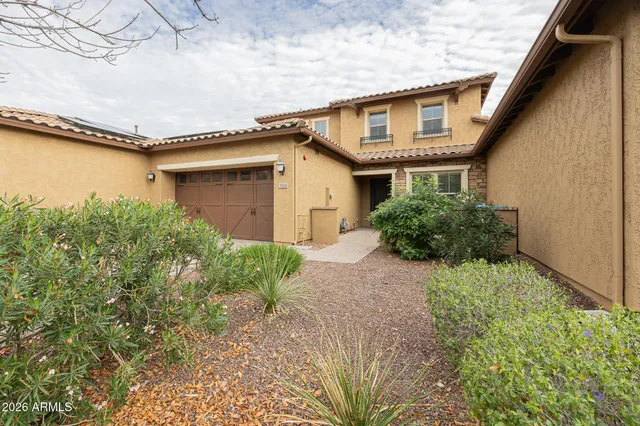 a house that has a lot of plants in it
