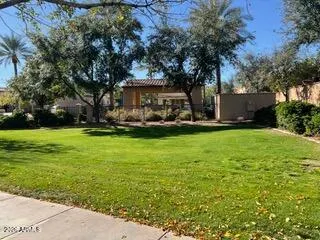 an aerial view of a house with yard swimming pool and outdoor seating