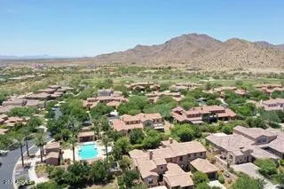 a vase of flowers sitting on a table