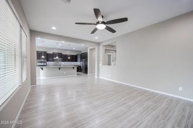 a view of kitchen with cabinets and wooden floor