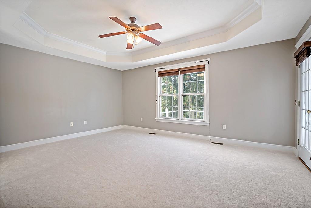 267 Berkeley Way Monroeville, PA 15146 - Photo 13 of 25 an empty room with chandelier fan and windows