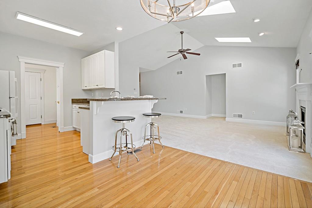 267 Berkeley Way Monroeville, PA 15146 - Photo 7 of 25 a view of kitchen and dining area with a sink wooden floor