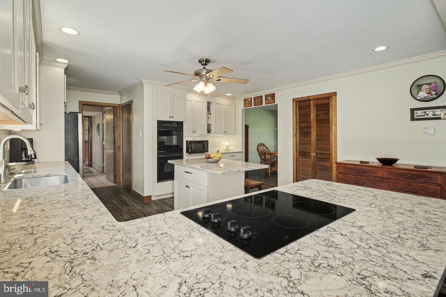 4661 Smith Road Newtown, PA 18940 - Photo 21 of 44 Cook Top and Quartz Counters