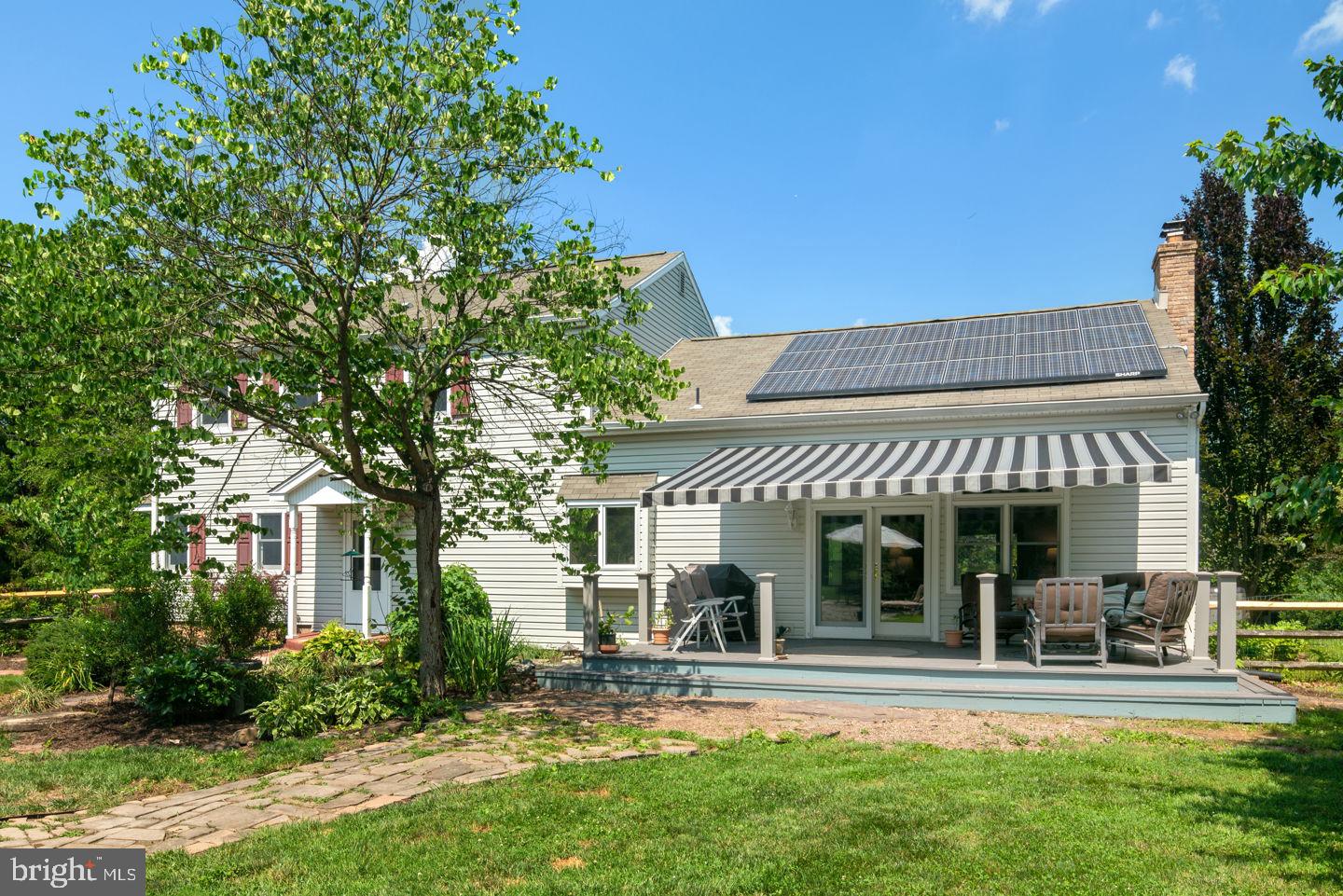 4661 Smith Road Newtown, PA 18940 - Photo 37 of 44 Solar Panels & Deck w/Automatic Retractable Awning