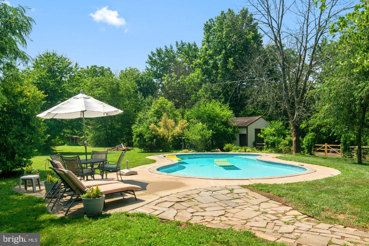4661 Smith Road Newtown, PA 18940 - Photo 38 of 44 In-Ground Pool with Lounge Area