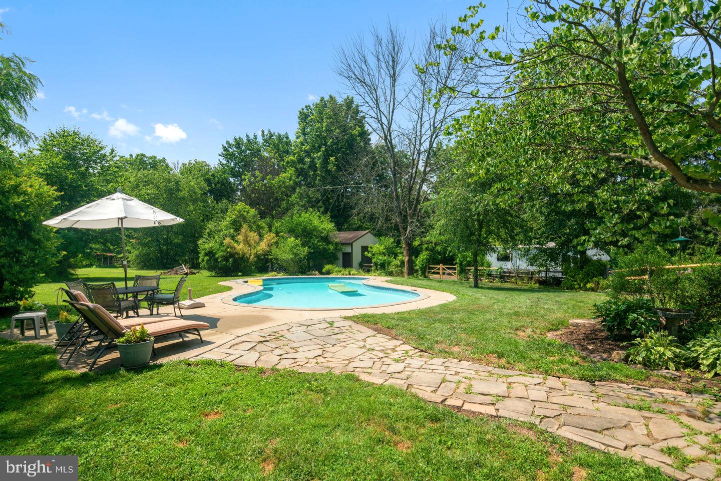 4661 Smith Road Newtown, PA 18940 - Photo 40 of 44 Walkway from Azek Deck to In-Ground Pool