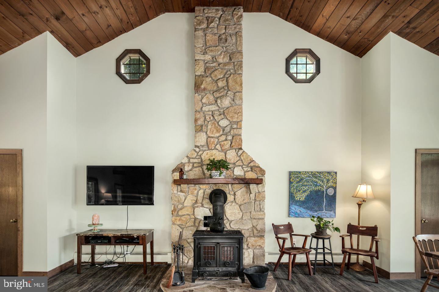 4661 Smith Road Newtown, PA 18940 - Photo 7 of 44 Floor/ Ceiling Stone Accent for Wood Burning Stove