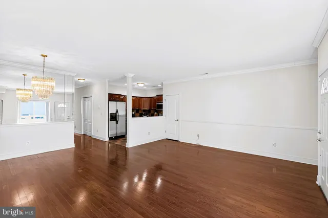 a kitchen with stainless steel appliances granite countertop a stove sink microwave and cabinets