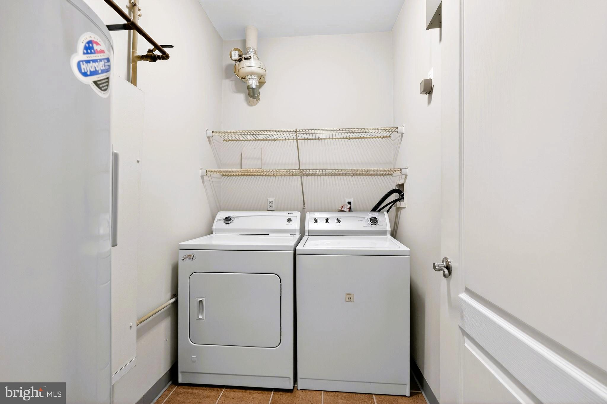 1630 Welsh Road, Unit 5A Philadelphia, PA 19115 - Photo 16 of 27 a utility room with dryer and washer