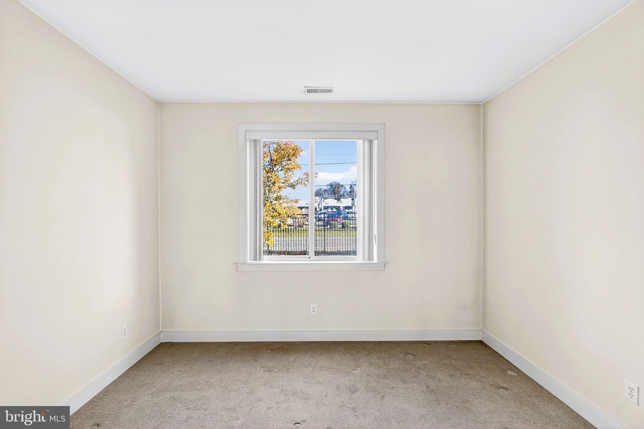 1630 Welsh Road, Unit 5A Philadelphia, PA 19115 - Photo 22 of 27 an empty room with a window