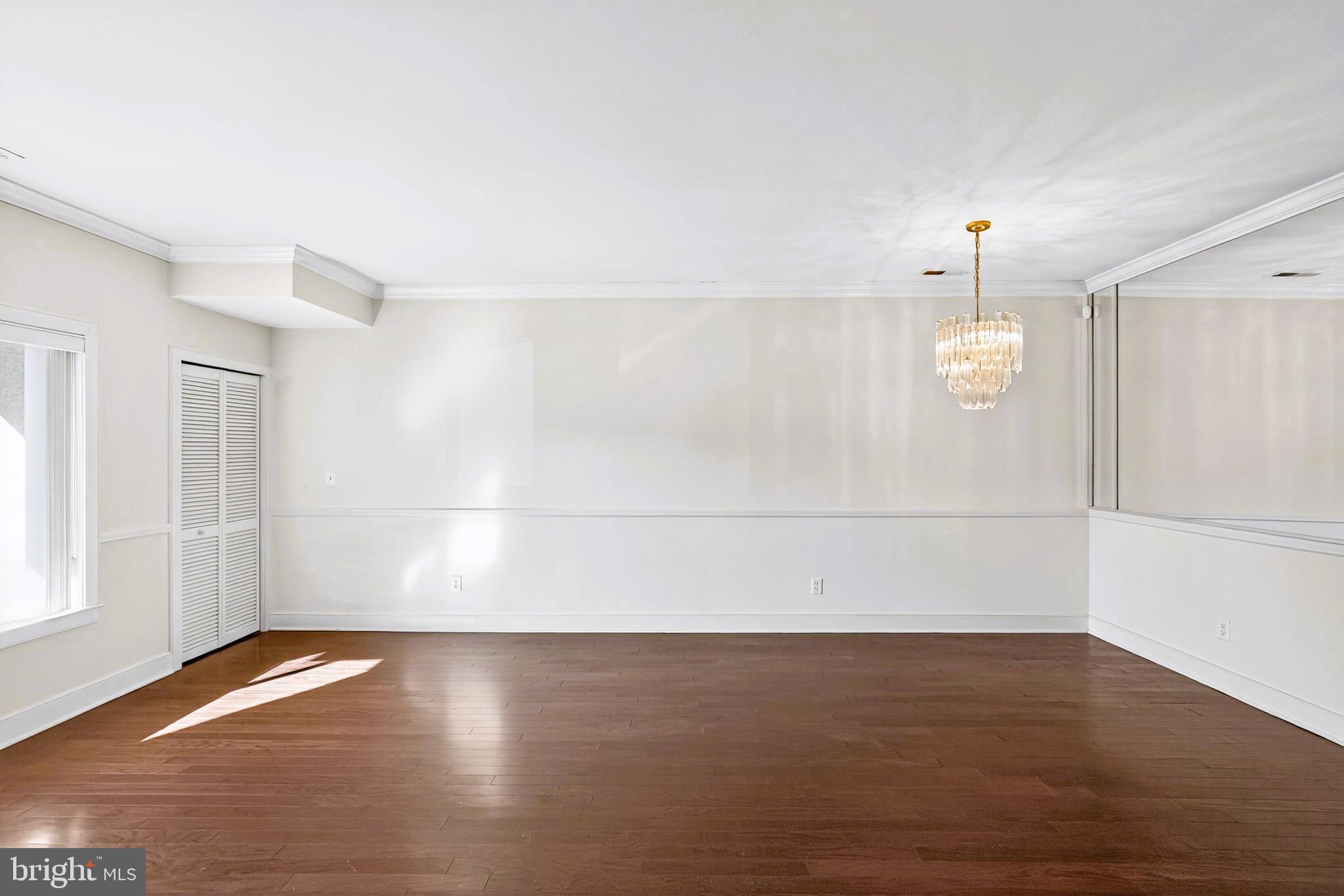 1630 Welsh Road, Unit 5A Philadelphia, PA 19115 - Photo 7 of 27 a view of a room with wooden floor and white walls