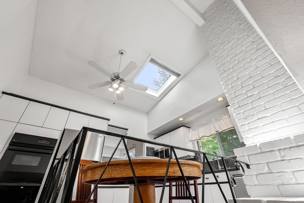 372 Old Connecticut Path Framingham, MA 01701 - Photo 17 of 33 a view of staircase with white walls and a window