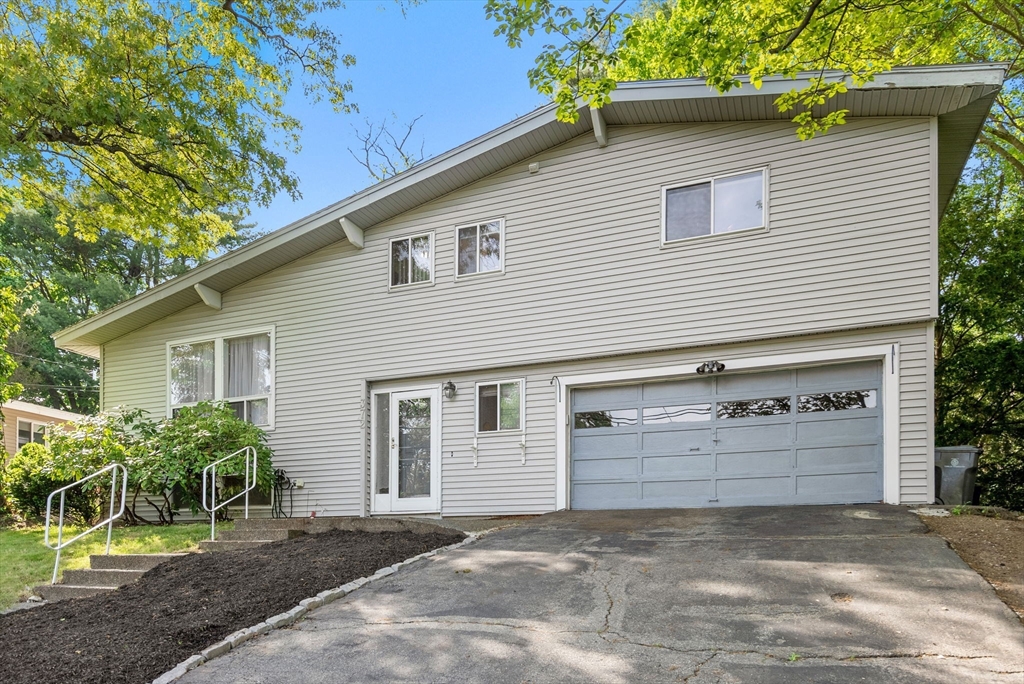 372 Old Connecticut Path Framingham, MA 01701 - Photo 2 of 33 a view of a house with a yard