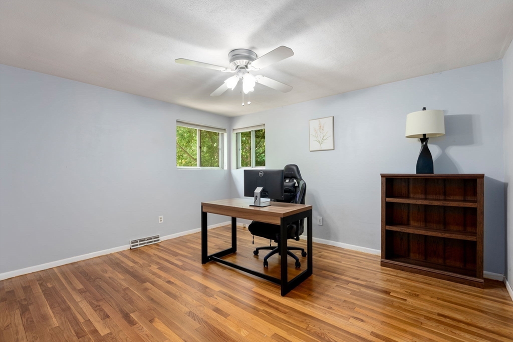 372 Old Connecticut Path Framingham, MA 01701 - Photo 22 of 33 a view of a workspace with furniture and a window