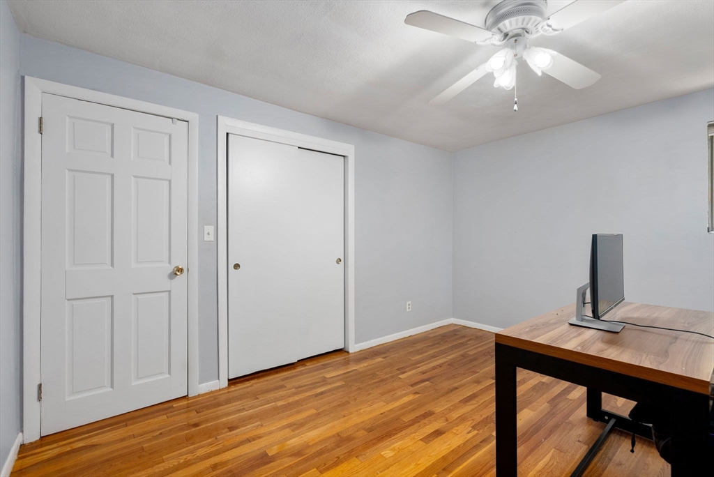372 Old Connecticut Path Framingham, MA 01701 - Photo 23 of 33 a view of a room with a chandelier fan