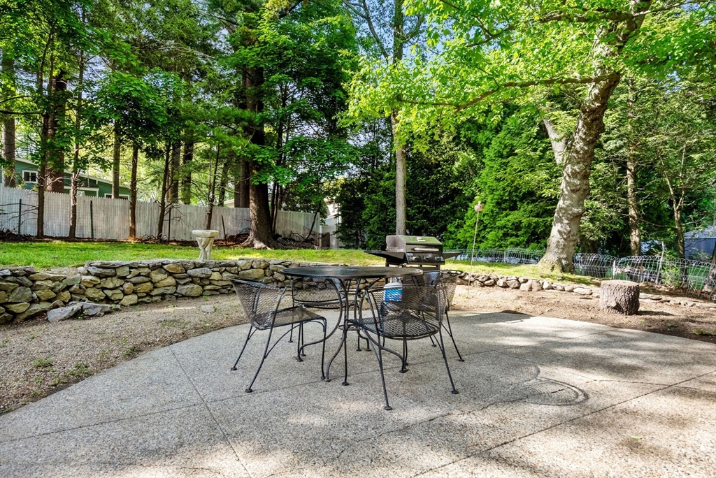 372 Old Connecticut Path Framingham, MA 01701 - Photo 26 of 33 a view of a backyard with sitting area