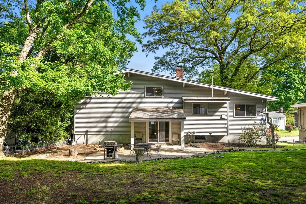 372 Old Connecticut Path Framingham, MA 01701 - Photo 29 of 33 a front view of house with yard patio and green space