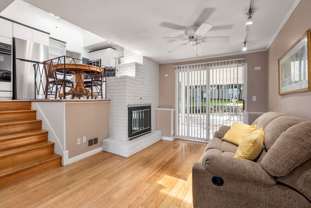 372 Old Connecticut Path Framingham, MA 01701 - Photo 4 of 33 a living room with furniture and a fireplace