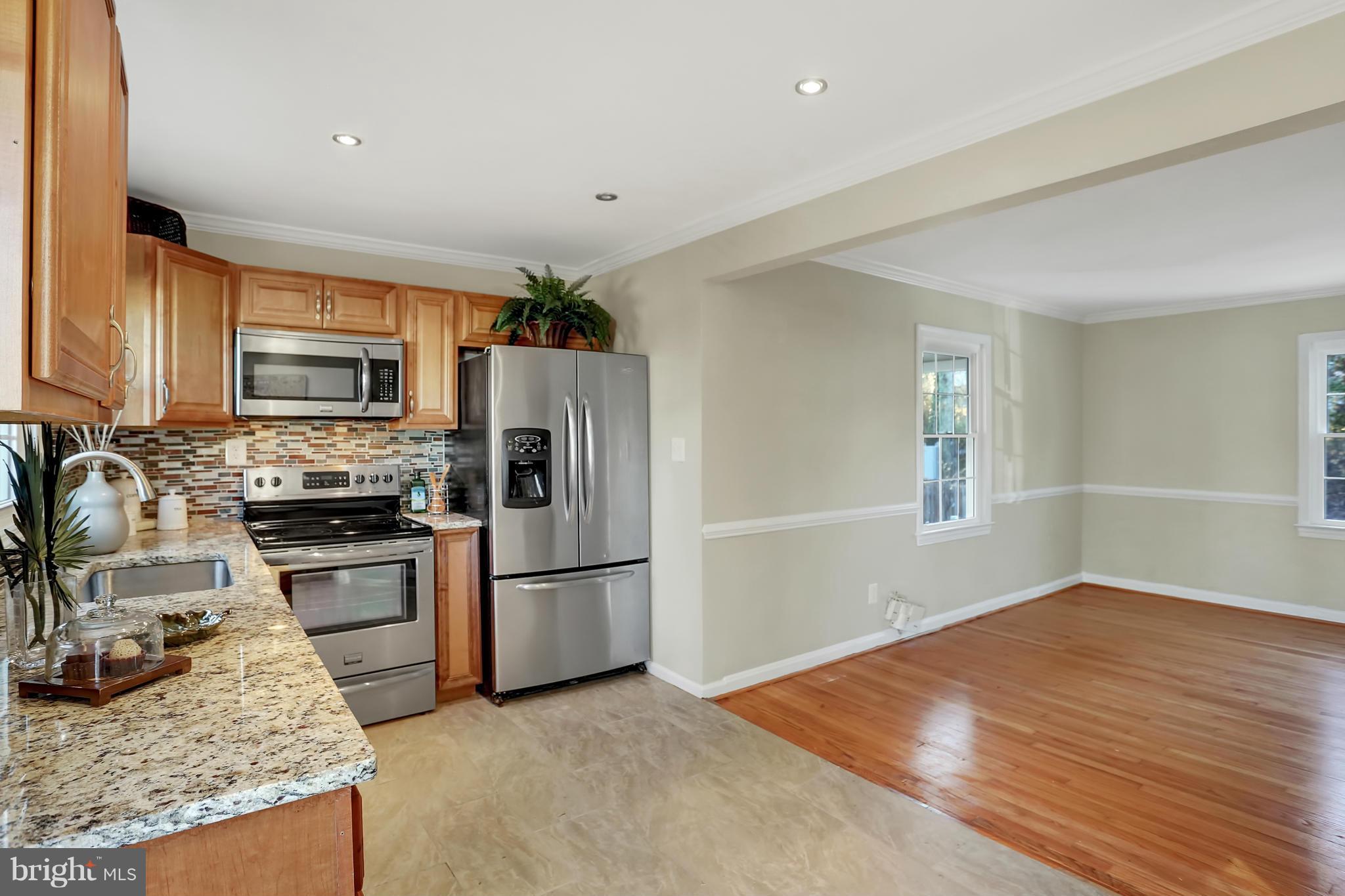 4013 Roberts Road Fairfax, VA 22032 - Photo 2 of 30 Kitchen with granite counters and SS appliances