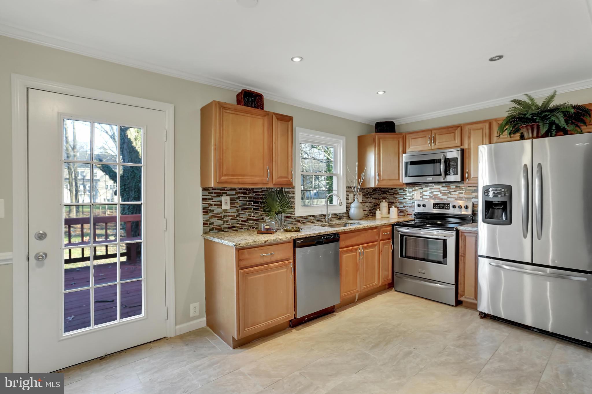 4013 Roberts Road Fairfax, VA 22032 - Photo 7 of 30 Kitchen with access to the rear deck