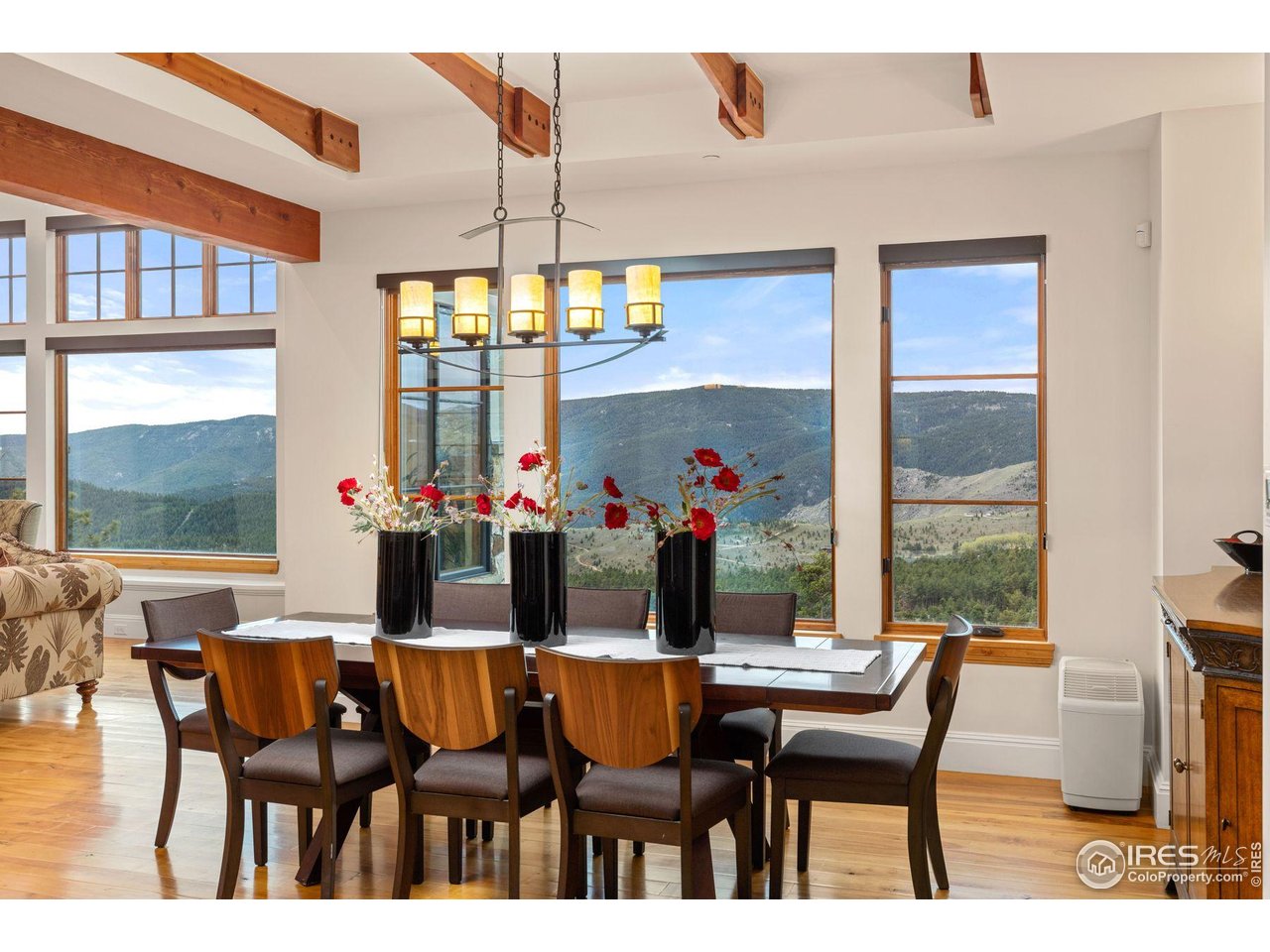 750 Left Fork Road Boulder, CO 80302 - Photo 18 of 39 a view of a dining room with furniture and window