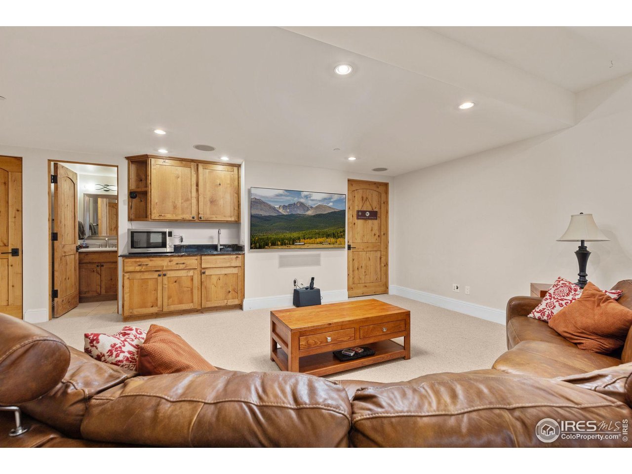 750 Left Fork Road Boulder, CO 80302 - Photo 29 of 39 a living room with furniture and kitchen view