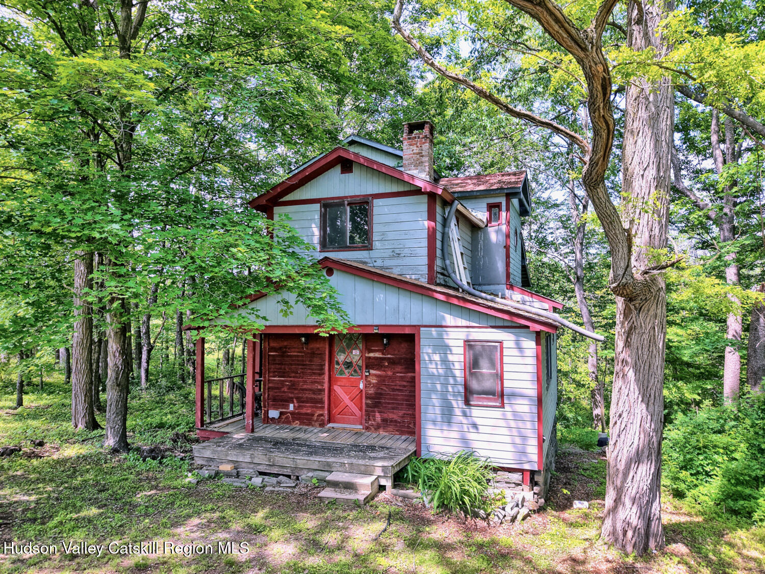 360 Stone Bridge Rd Extension East Durham, NY 12423 - Photo 57 of 83 a front view of a house with garden
