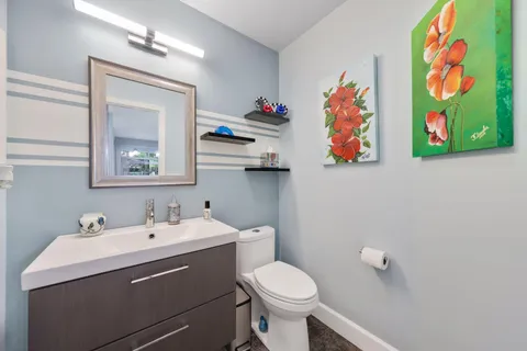 a view of a swimming pool with a patio and a garden