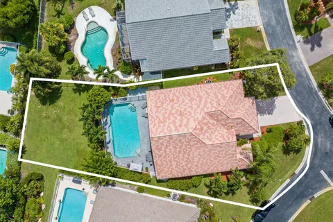 a kitchen with stainless steel appliances a refrigerator sink and stove
