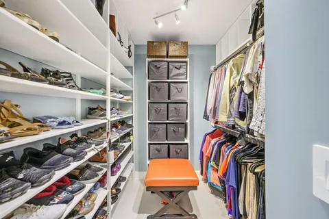 a front view of house with yard and outdoor seating