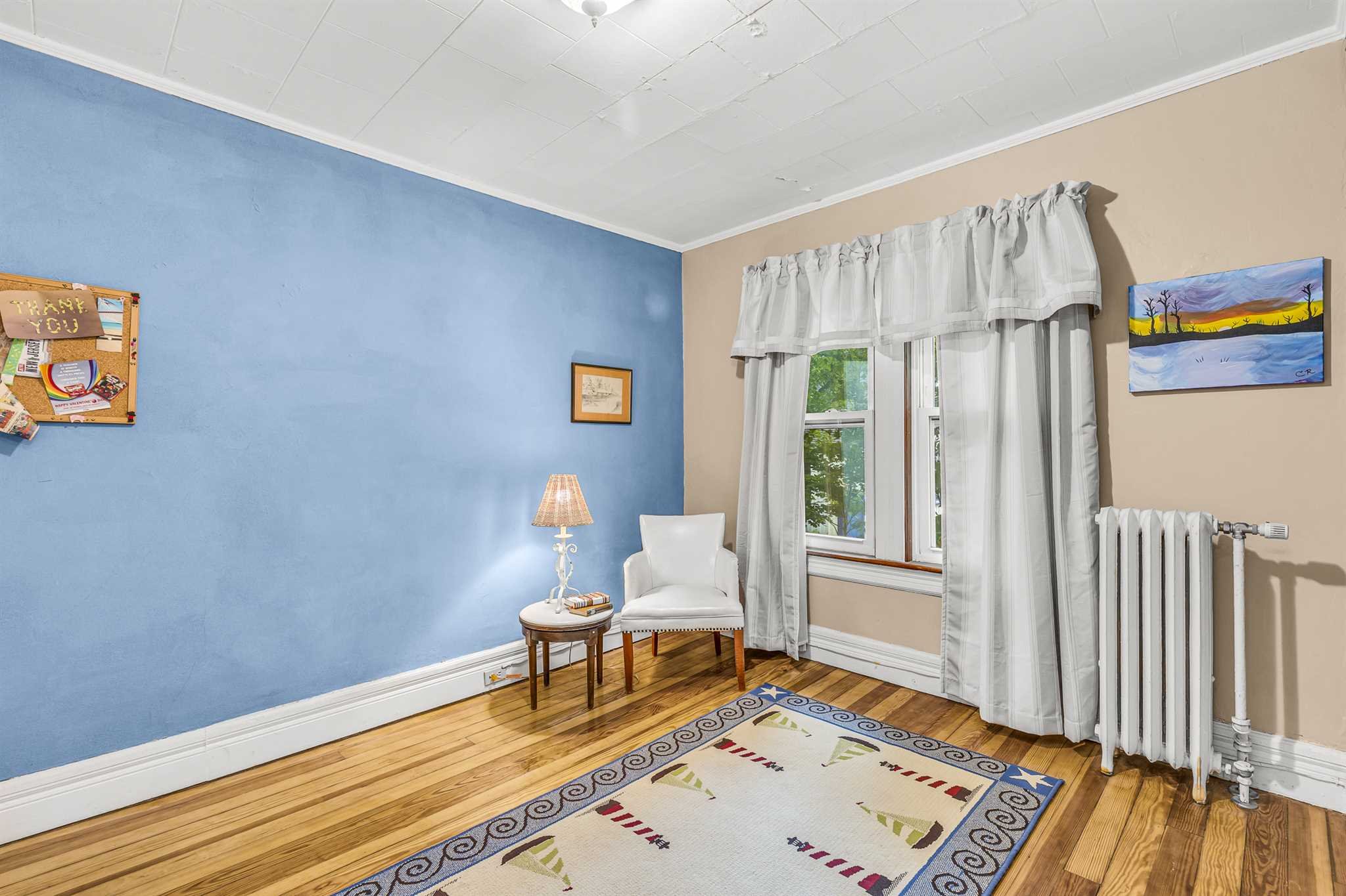 22 Pine Street Pine Plains, NY 12567 - Photo 17 of 25 a living room with furniture and a window