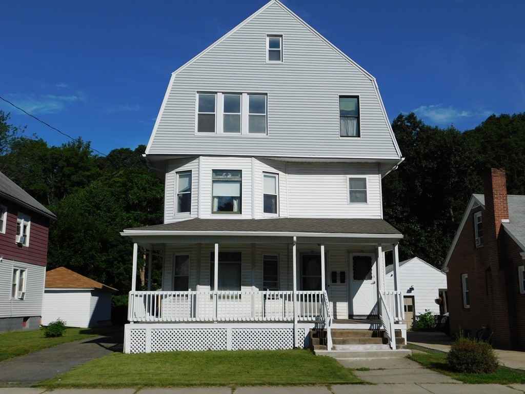 44-46 Langdon Street Springfield, MA 01104 - Photo 1 of 30 a front view of a house with a yard