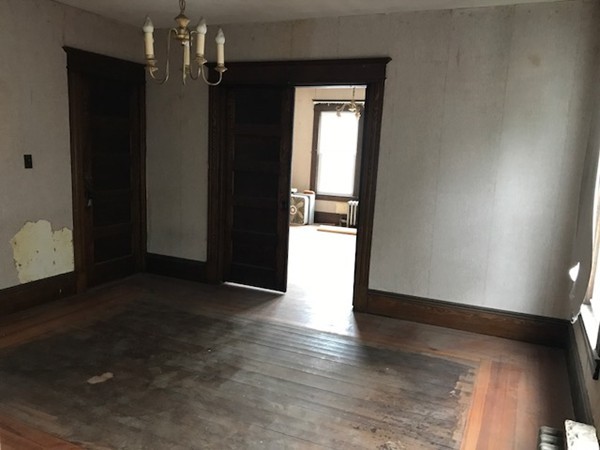44-46 Langdon Street Springfield, MA 01104 - Photo 17 of 30 a view of a hallway with wooden floor