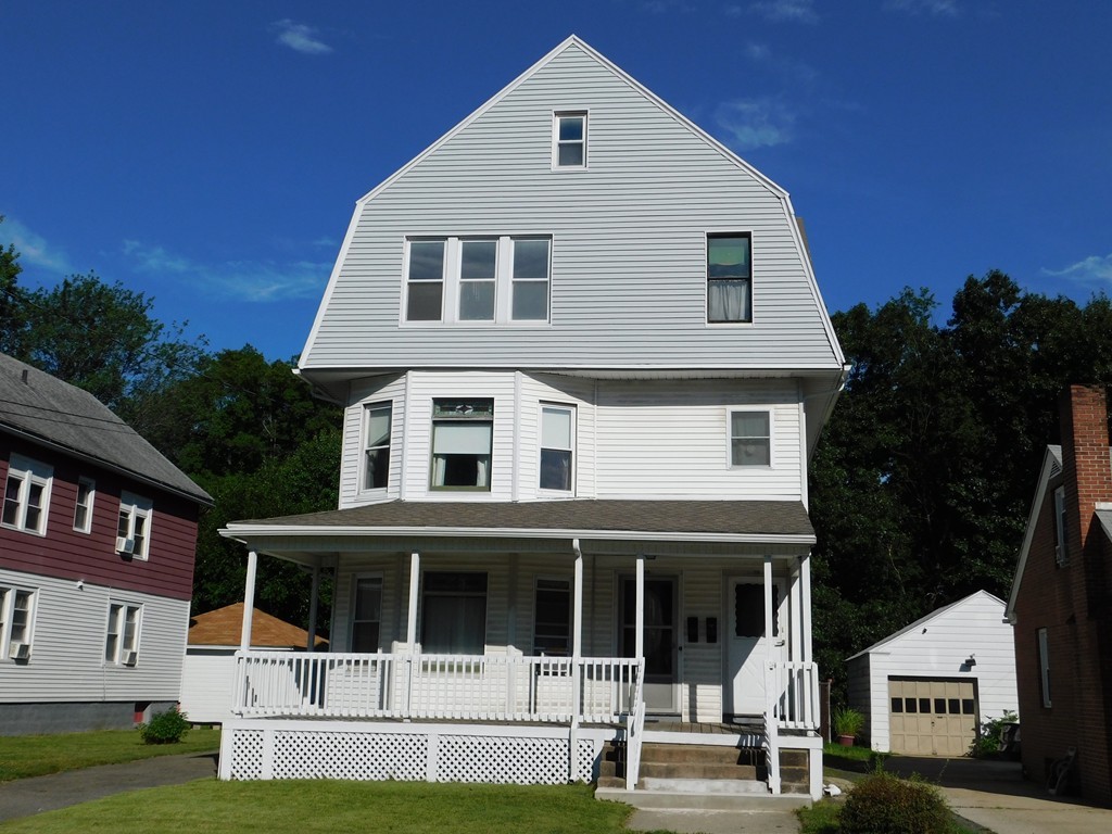 44-46 Langdon Street Springfield, MA 01104 - Photo 2 of 30 a front view of a house with a yard