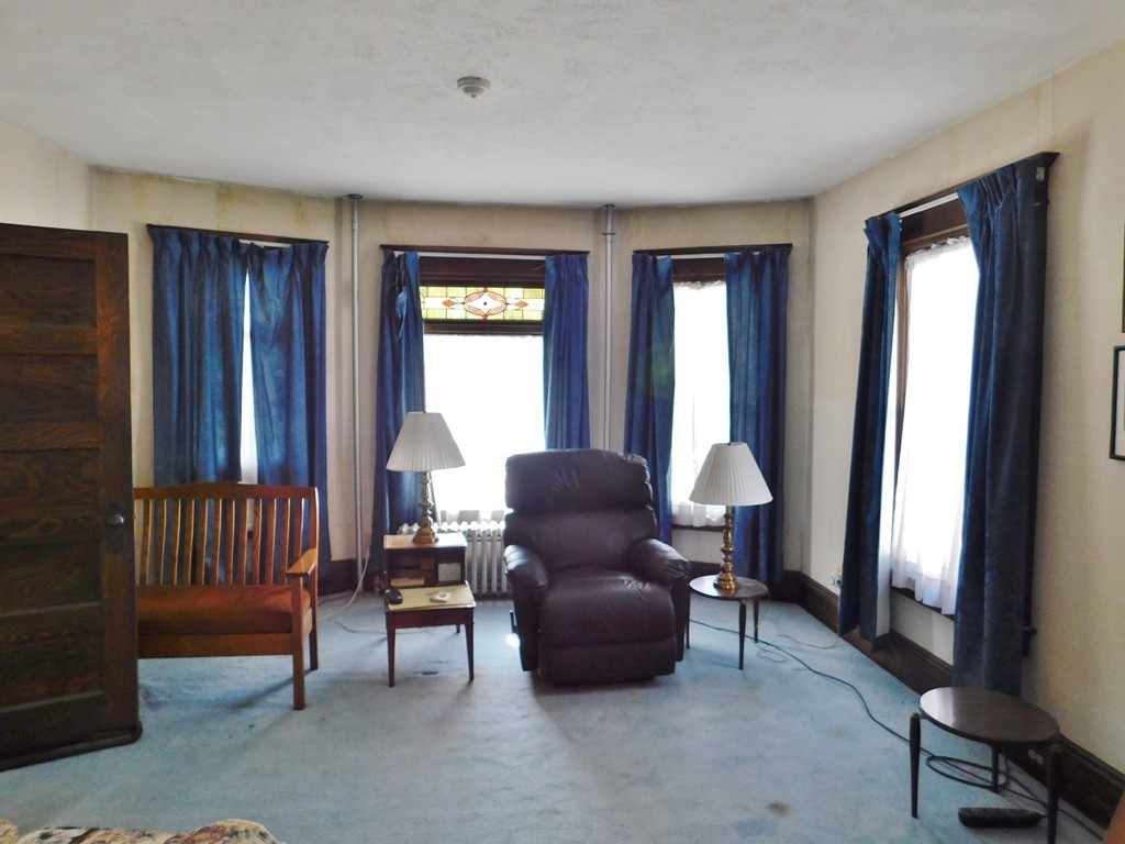 44-46 Langdon Street Springfield, MA 01104 - Photo 7 of 30 a living room with furniture and a window