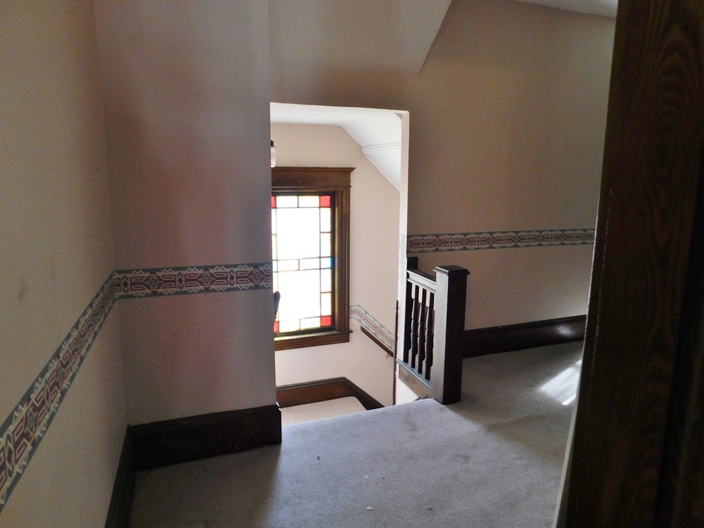 44-46 Langdon Street Springfield, MA 01104 - Photo 8 of 30 a view of a hallway with windows