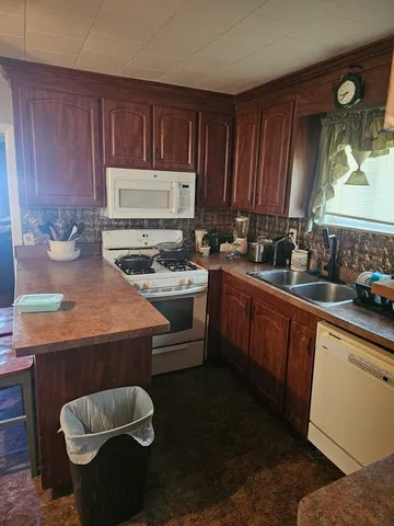 a view of a hallway with staircase
