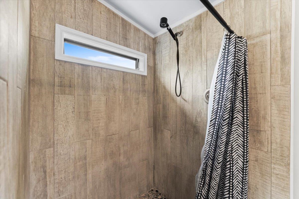 6860 Catlett Road St. Augustine, FL 32095 - Photo 15 of 36 Bathroom view of a tile shower
