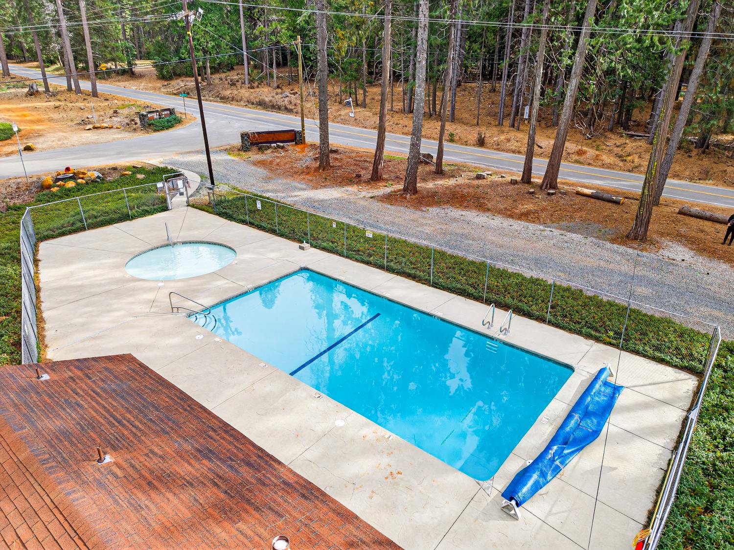 6300 Merry Way Clipper Mills, CA 95930 - Photo 54 of 69 a view of a swimming pool with a patio and wooden fence