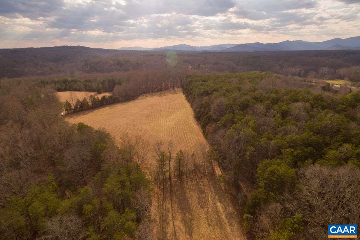 Parcel E Durrett Ridge Road Earlysville, VA 22936 - Photo 14 of 16 a view of a dry yard with mountains in the background