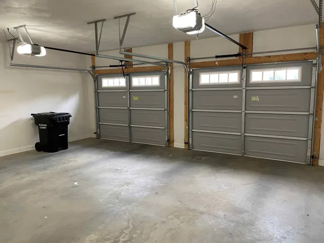a view of room that has a garage