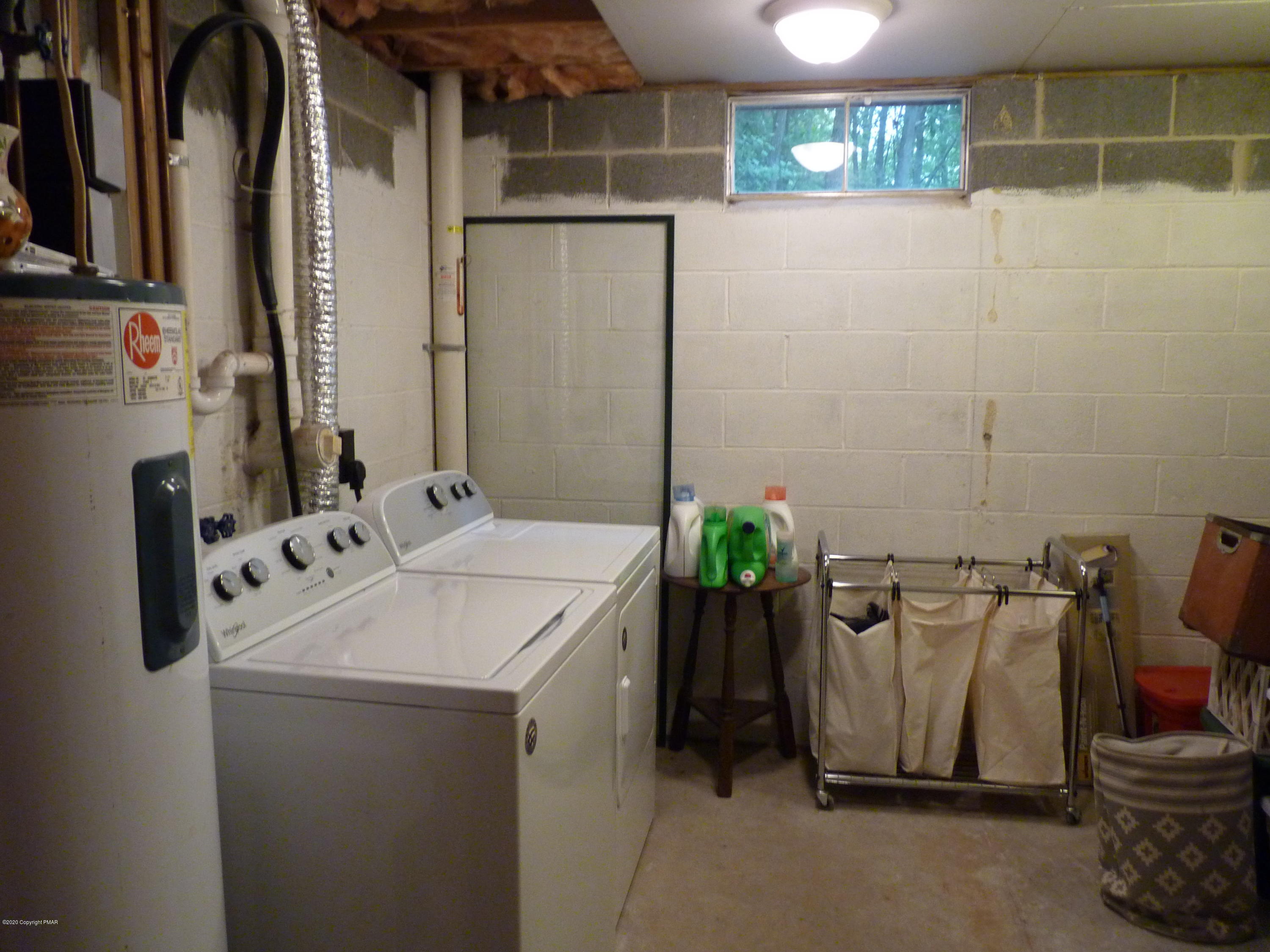 139 Fern Ridge Road Blakeslee, PA 18610 - Photo 17 of 19 a utility room with dryer and washer