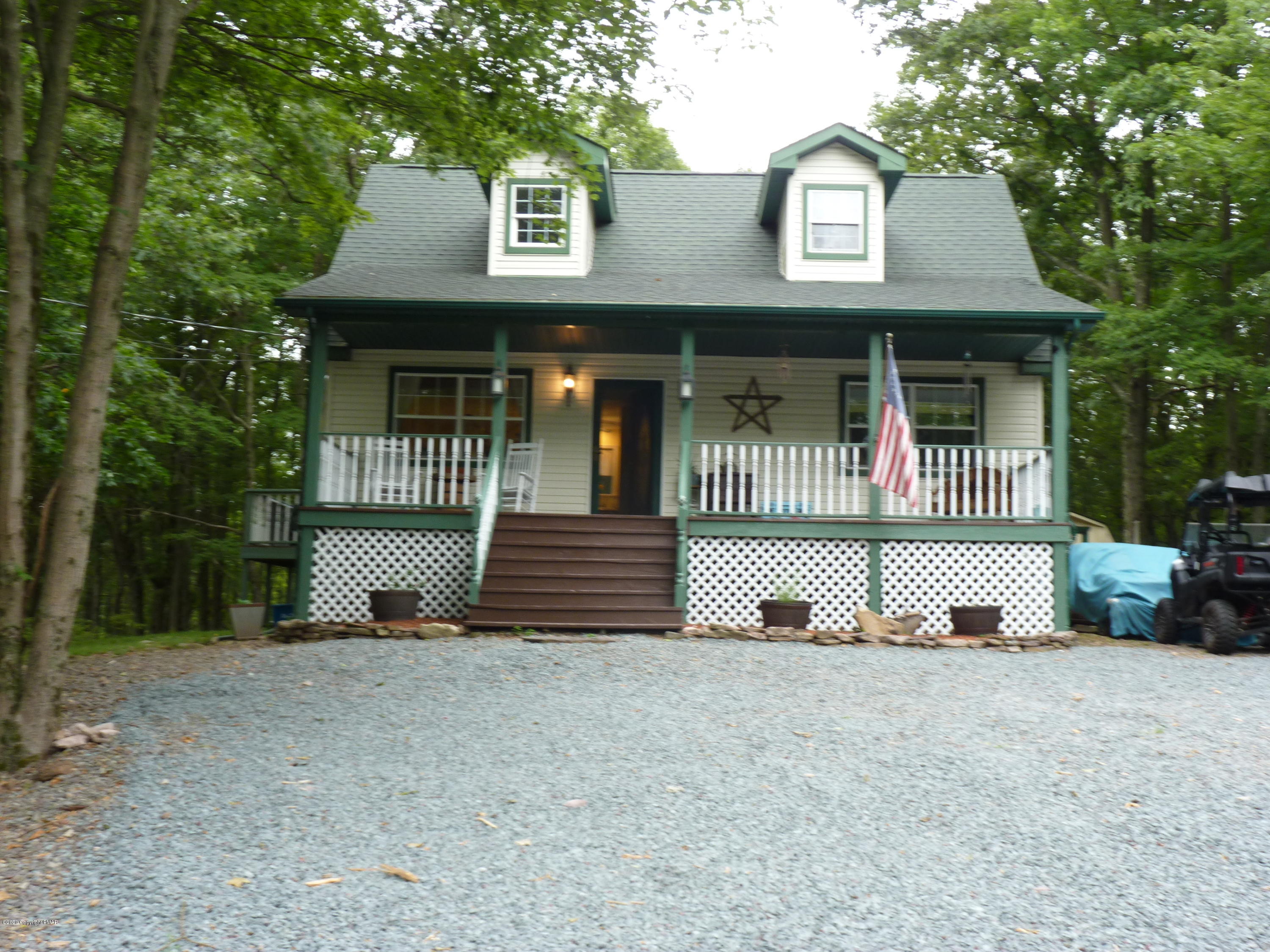 139 Fern Ridge Road Blakeslee, PA 18610 - Photo 2 of 19 a front view of a house with a yard