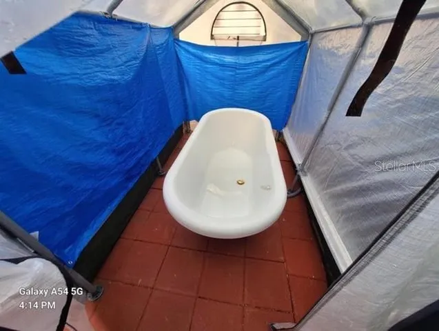 a view of wooden floor in hallway